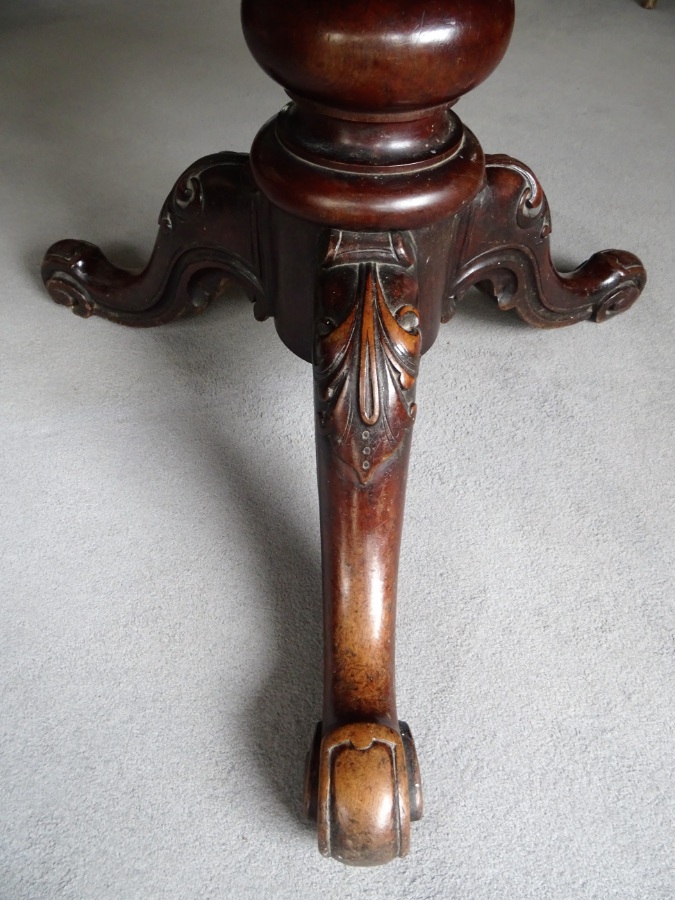 beautifully carved and turned tripod base